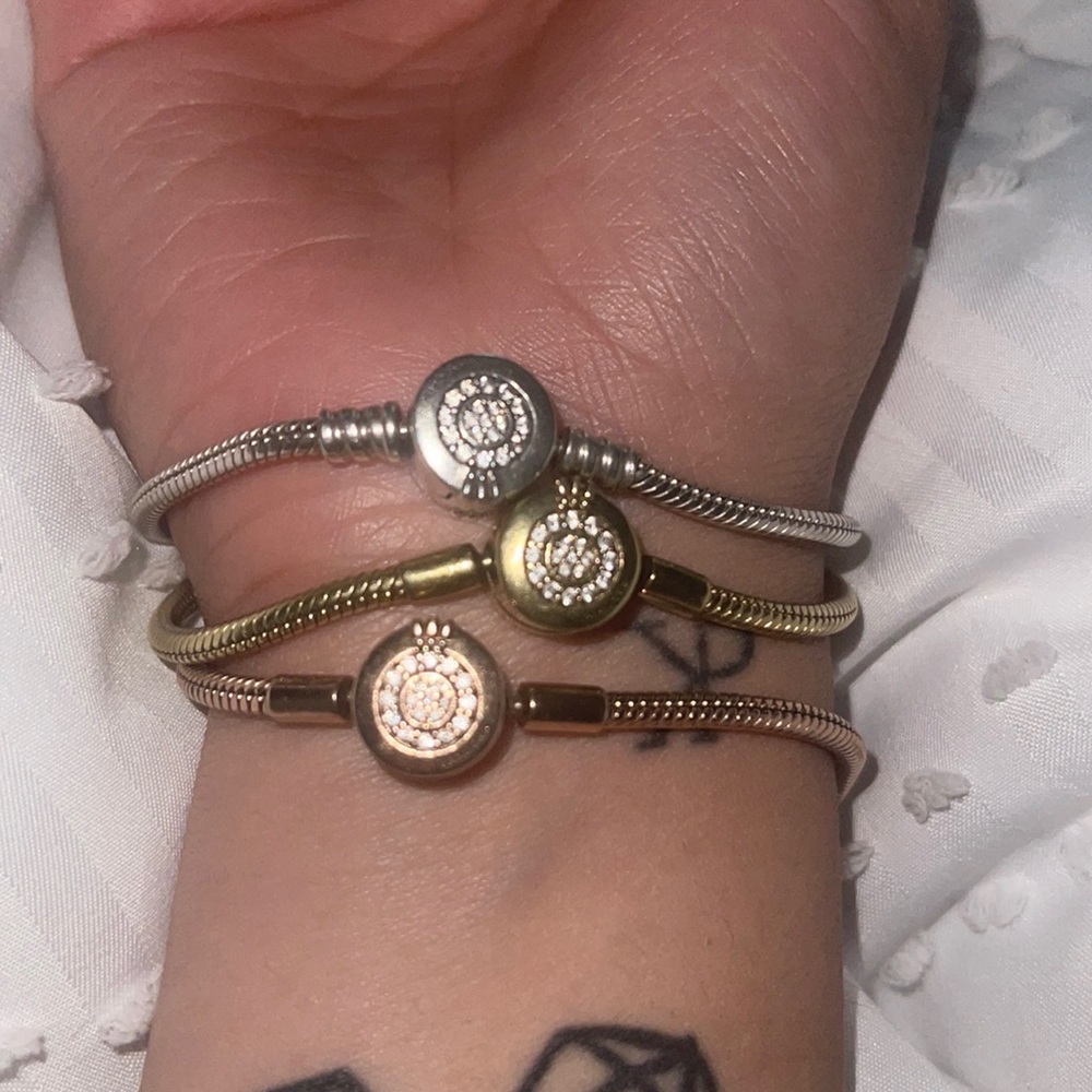 trio of pandora bracelets